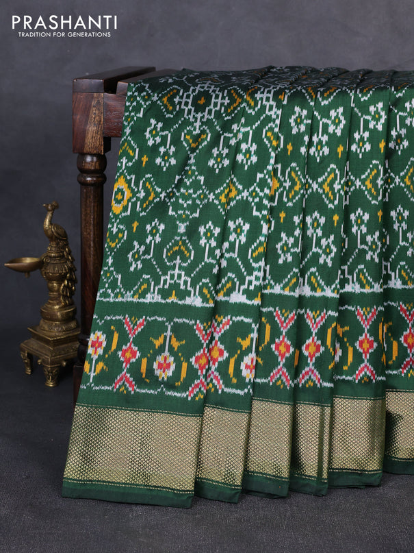 Pochampally silk saree bottle green with allover ikat weaves and zari woven border
