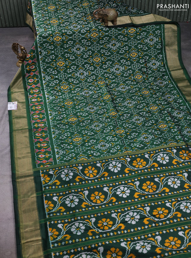 Pochampally silk saree bottle green with allover ikat weaves and zari woven border