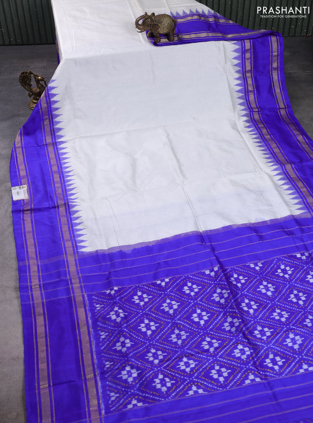 Pochampally silk saree off white and royal blue with plain body and ikat rettapet zari woven border