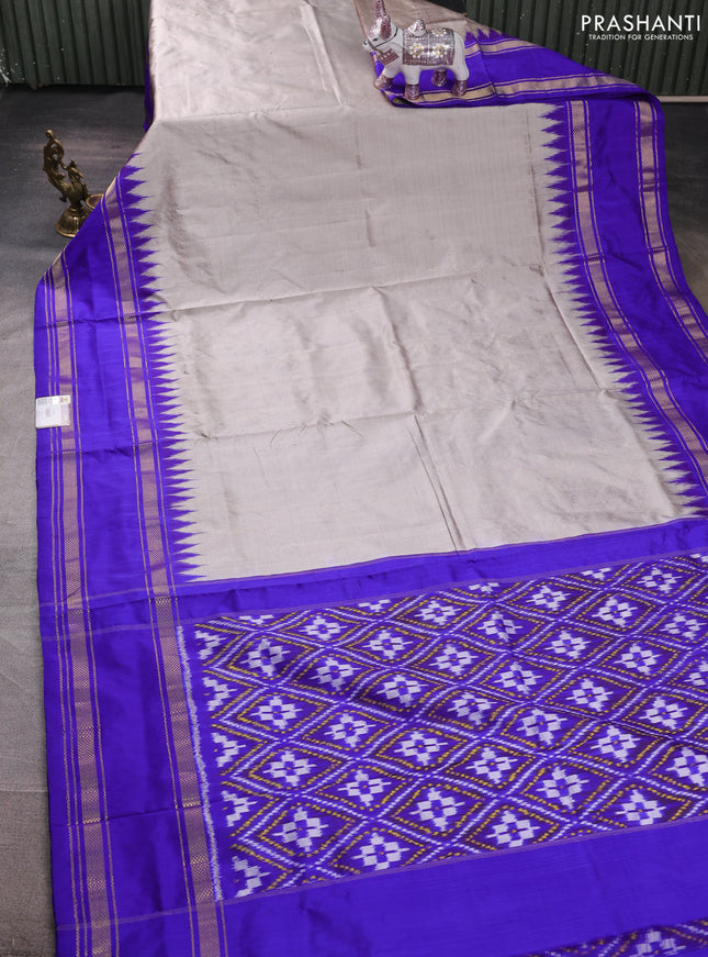 Pochampally silk saree grey and royal blue with plain body and ikat rettapet zari woven border