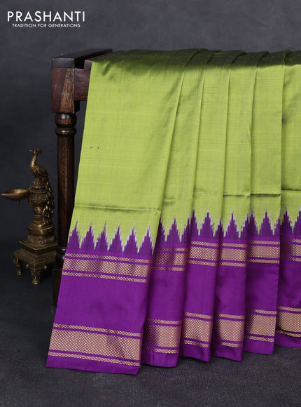 Pochampally silk saree green and purple with plain body and ikat rettapet zari woven border