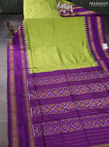 Pochampally silk saree green and purple with plain body and ikat rettapet zari woven border