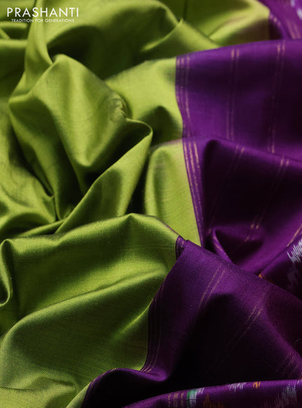 Pochampally silk saree green and purple with plain body and ikat rettapet zari woven border