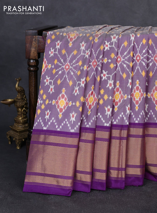 Pochampally silk saree pastel purple and purple with allover ikat weaves and long zari woven border