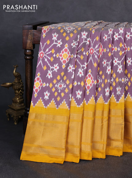 Pochampally silk saree pastel purple and mustard yellow with allover ikat weaves and long zari woven border