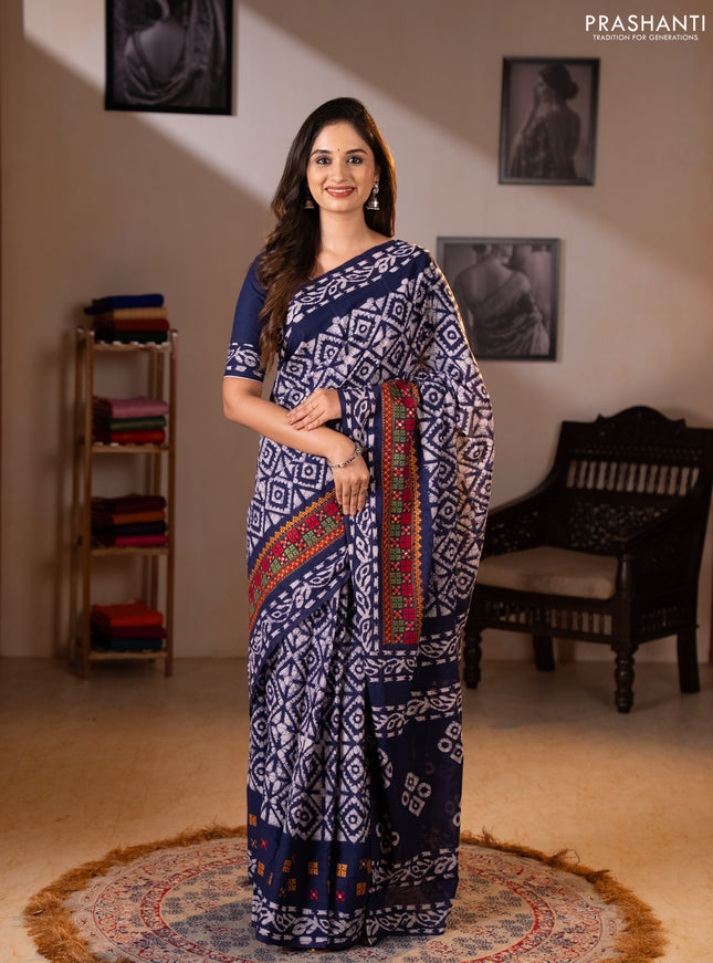 Batik cotton saree indigo blue with allover batik prints and embroidery mirror work border