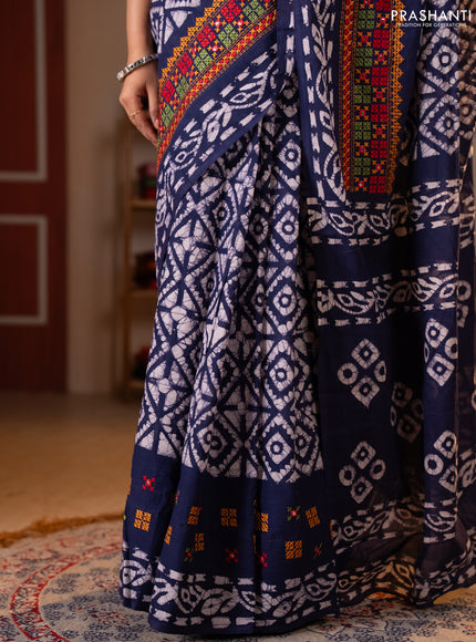 Batik cotton saree indigo blue with allover batik prints and embroidery mirror work border