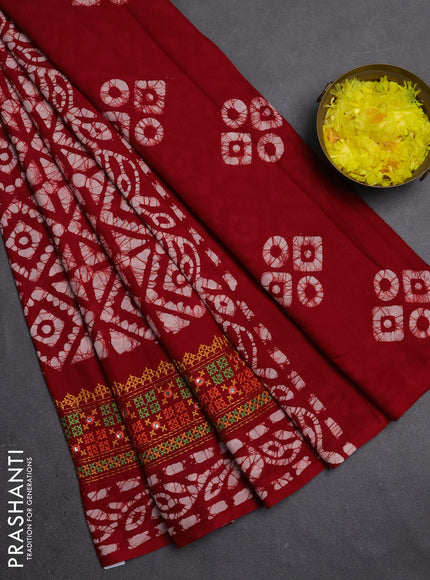 Batik cotton saree red with allover batik prints and embroidery mirror work border