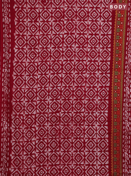 Batik cotton saree red with allover batik prints and embroidery mirror work border