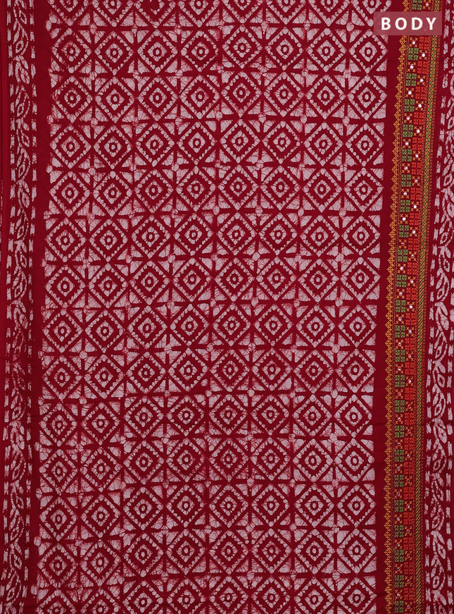 Batik cotton saree red with allover batik prints and embroidery mirror work border