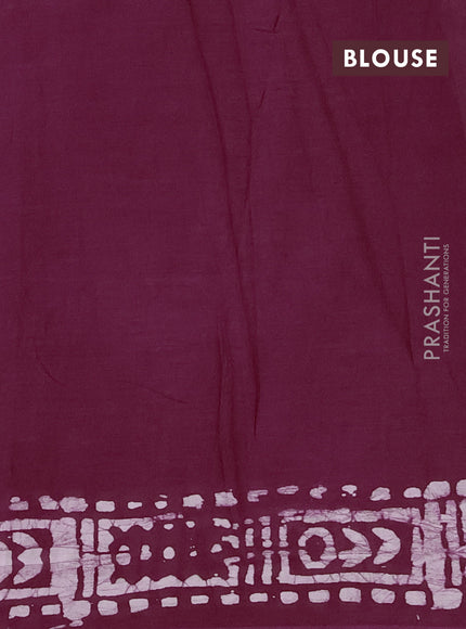 Batik cotton saree wine shade with allover batik prints and embroidery mirror work border