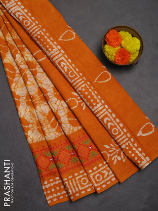 Batik cotton saree mango yellow with allover batik prints and embroidery mirror work border