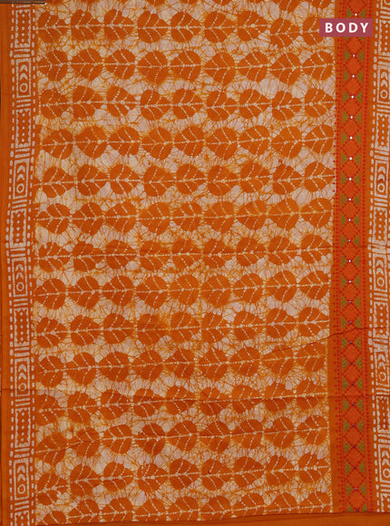 Batik cotton saree mango yellow with allover batik prints and embroidery mirror work border