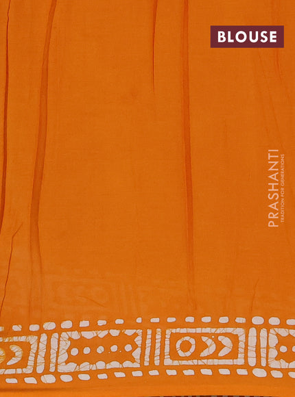 Batik cotton saree mango yellow with allover batik prints and embroidery mirror work border
