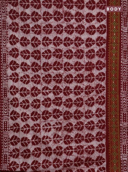 Batik cotton saree maroon with allover batik prints and embroidery mirror work border