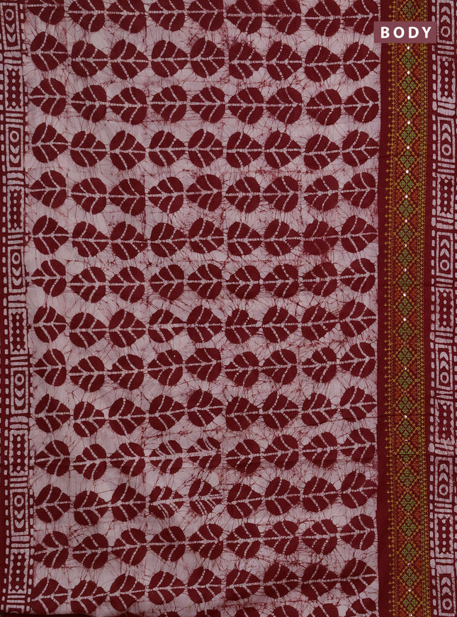 Batik cotton saree maroon with allover batik prints and embroidery mirror work border