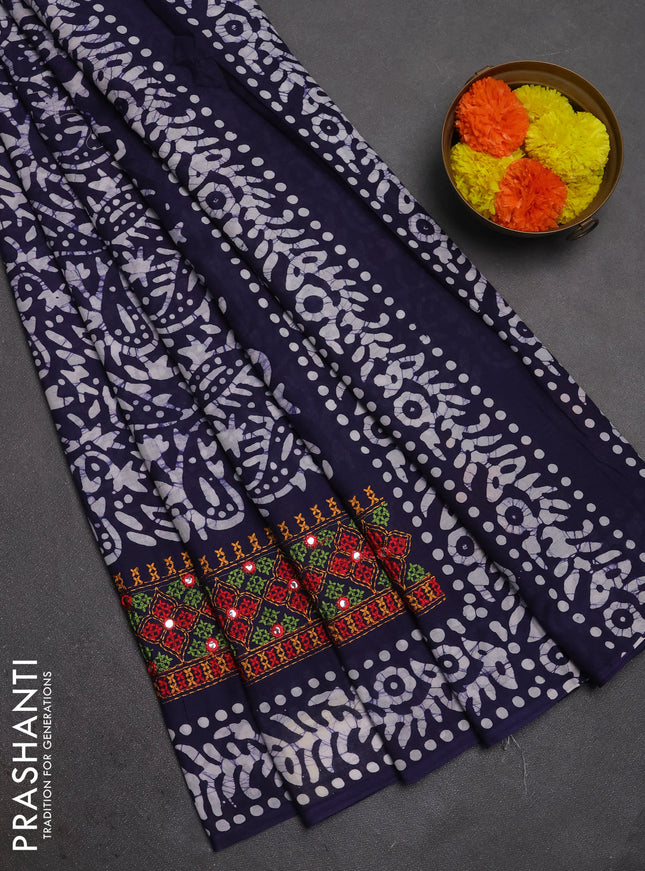 Batik cotton saree navy blue with allover batik prints and embroidery mirror work border