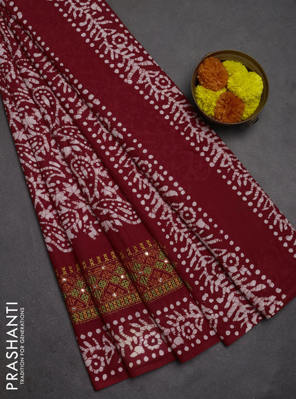 Batik cotton saree red with allover batik prints and embroidery mirror work border