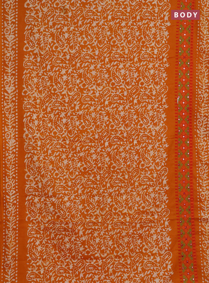Batik cotton saree mango yellow with allover batik prints and embroidery mirror work border