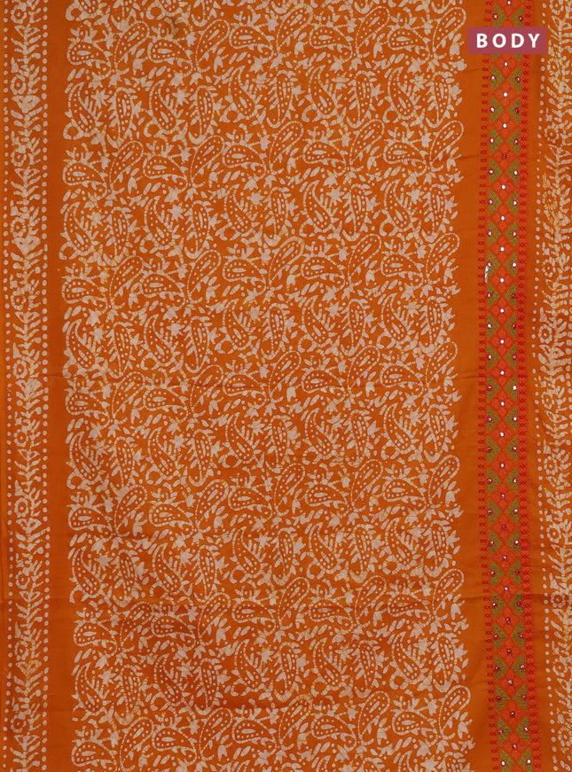 Batik cotton saree mango yellow with allover batik prints and embroidery mirror work border