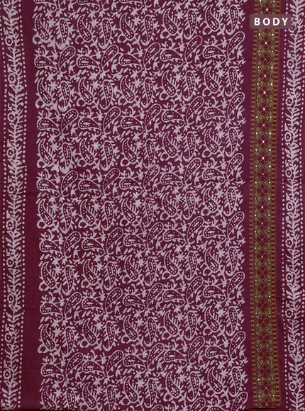 Batik cotton saree deep wine shade with allover batik prints and embroidery mirror work border
