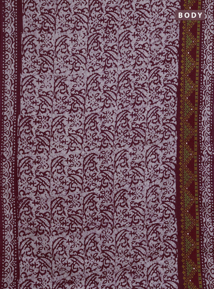 Batik cotton saree deep wine with allover batik prints and embroidery mirror work border
