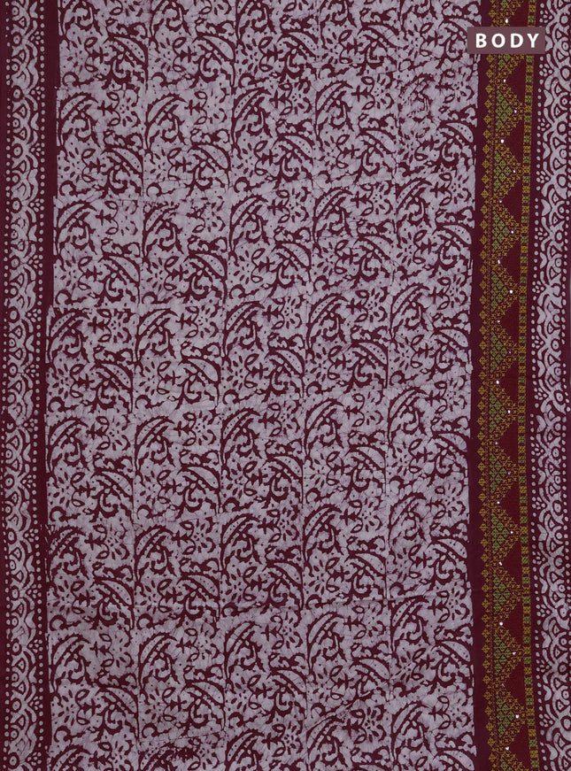 Batik cotton saree deep wine with allover batik prints and embroidery mirror work border