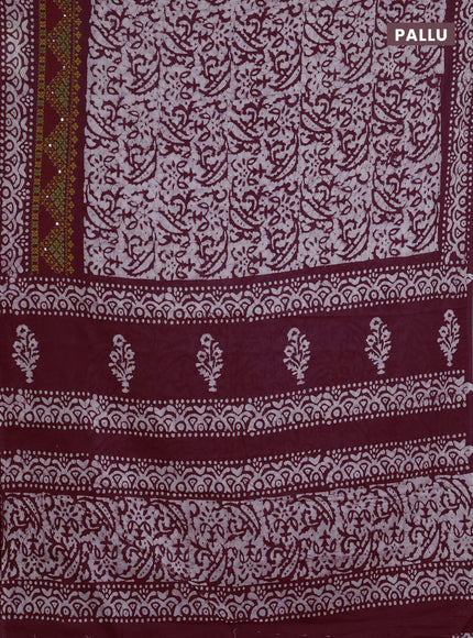 Batik cotton saree deep wine with allover batik prints and embroidery mirror work border