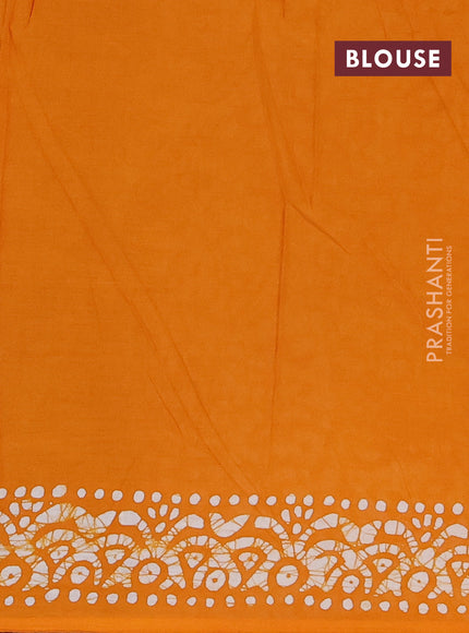 Batik cotton saree mango yellow with allover batik prints and embroidery mirror work border