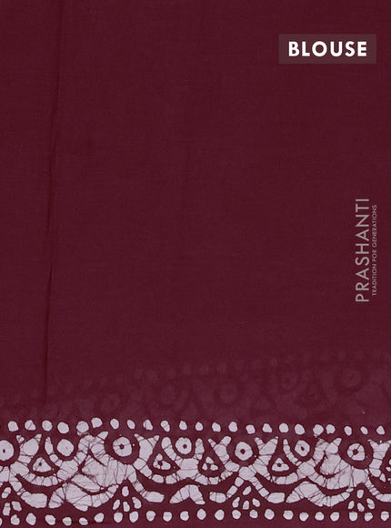 Batik cotton saree deep wine with allover batik prints and embroidery mirror work border