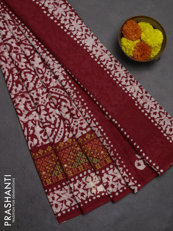 Batik cotton saree red with allover batik prints and embroidery mirror work border