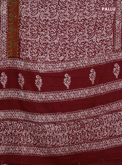 Batik cotton saree red with allover batik prints and embroidery mirror work border