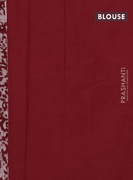 Batik cotton saree red with allover batik prints and embroidery mirror work border