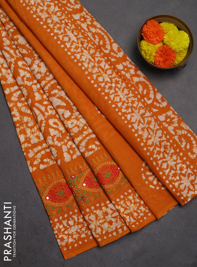Batik cotton saree mango yellow with allover batik prints and embroidery mirror work border