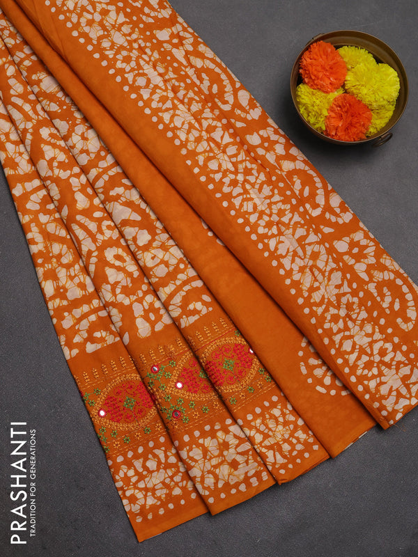 Batik cotton saree mango yellow with allover batik prints and embroidery mirror work border