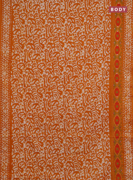 Batik cotton saree mango yellow with allover batik prints and embroidery mirror work border