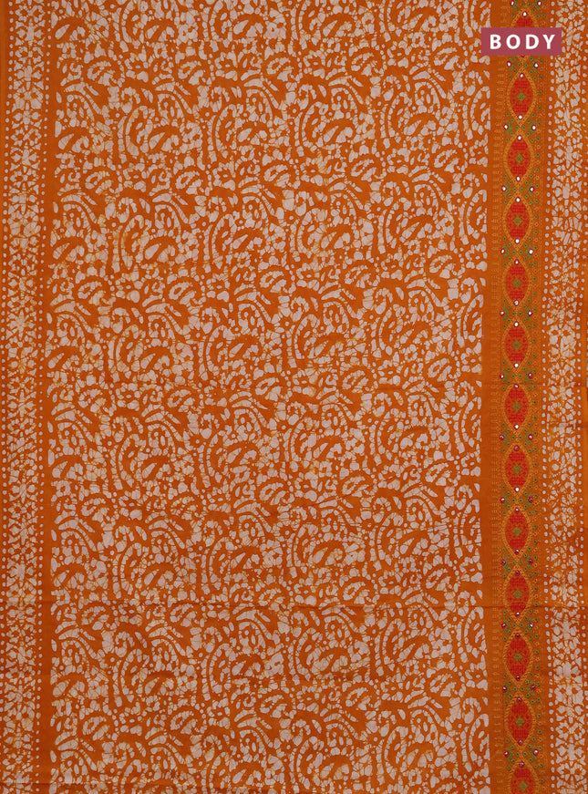 Batik cotton saree mango yellow with allover batik prints and embroidery mirror work border