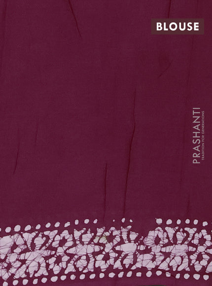 Batik cotton saree wine shade with allover batik prints and embroidery mirror work border
