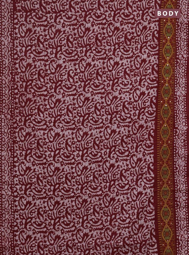 Batik cotton saree maroon with allover batik prints and embroidery mirror work border
