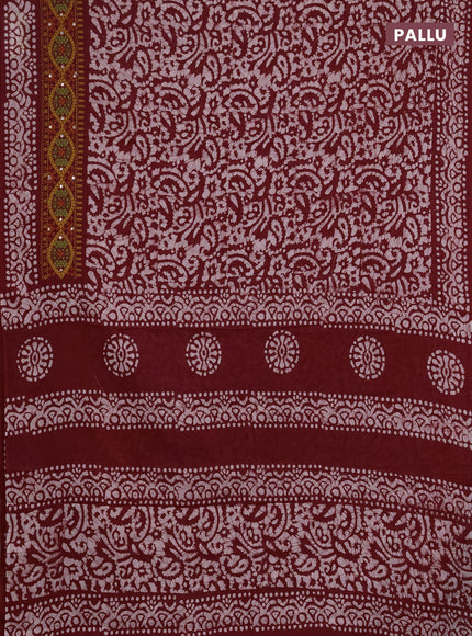Batik cotton saree maroon with allover batik prints and embroidery mirror work border