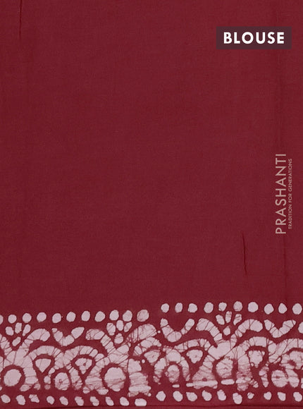 Batik cotton saree maroon with allover batik prints and embroidery mirror work border