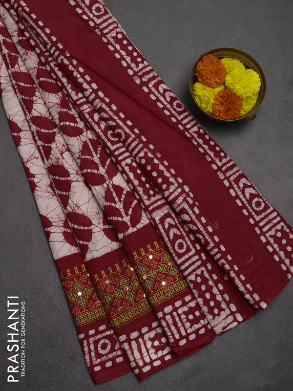 Batik cotton saree beige and red with allover batik prints and embroidery mirror work border