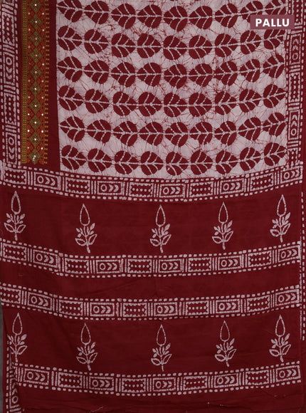Batik cotton saree beige and red with allover batik prints and embroidery mirror work border