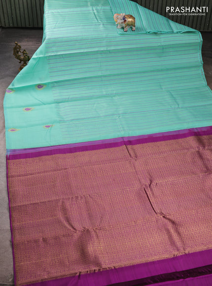 Kora kanchipuram silk saree teal green and purple with allover thread & zari weaves and long zari woven butta border