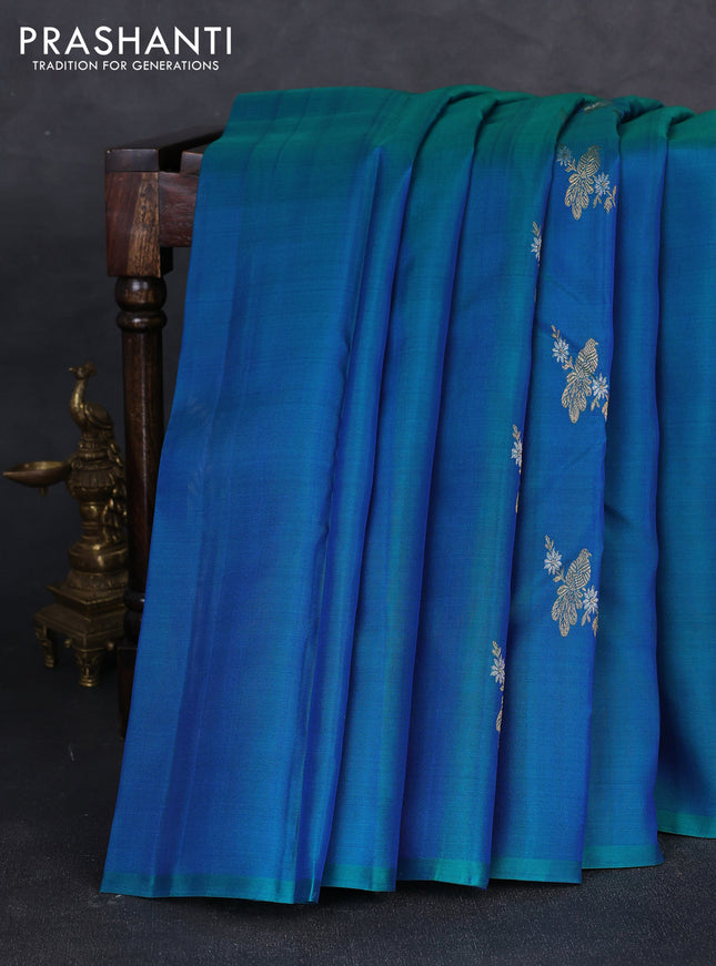 Kora kanchipuram silk saree dual shade of bluish green and pink with allover silver & zari woven buttas in borderless style
