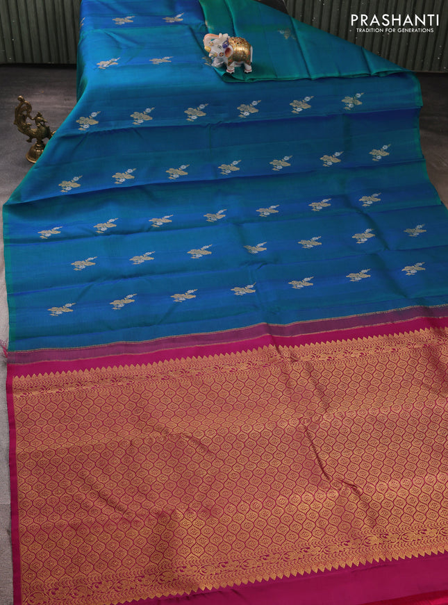 Kora kanchipuram silk saree dual shade of bluish green and pink with allover silver & zari woven buttas in borderless style