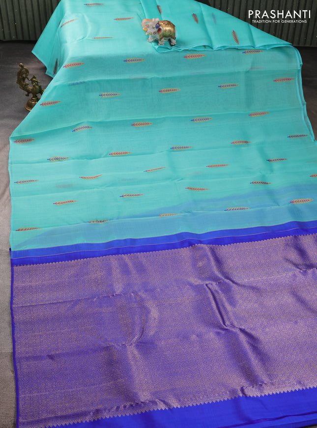 Kora kanchipuram silk saree teal blue and royal blue with thread & zari woven buttas in borderless style