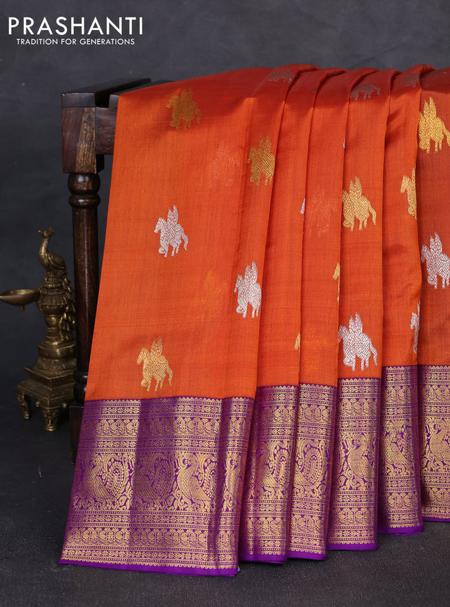 Kora kanchipuram silk saree rustic orange and purple with silver & gold zari woven buttas and rich zari woven annam border