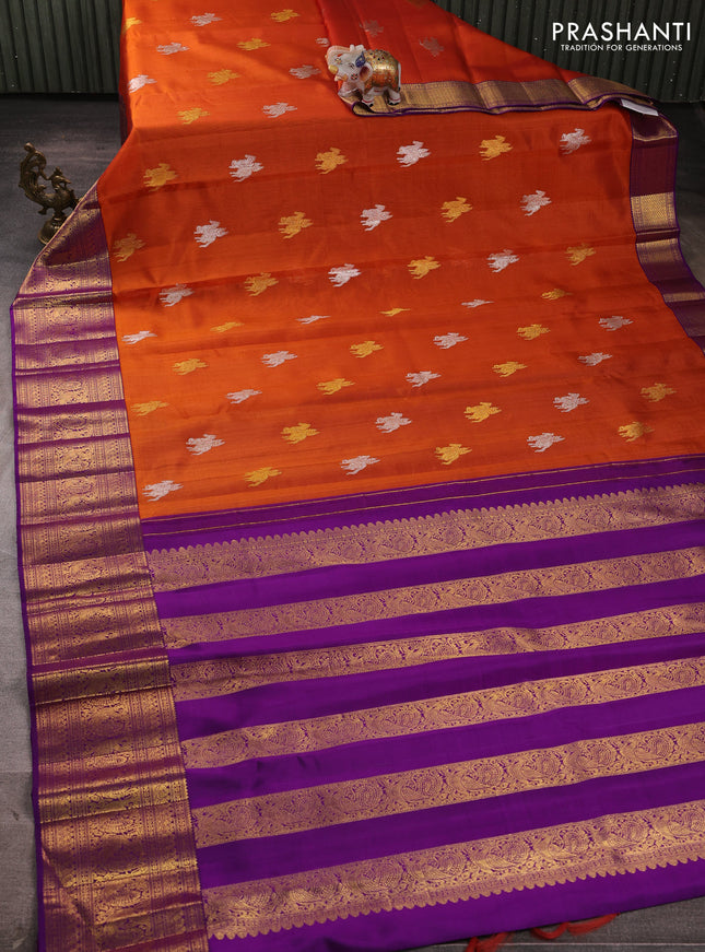 Kora kanchipuram silk saree rustic orange and purple with silver & gold zari woven buttas and rich zari woven annam border
