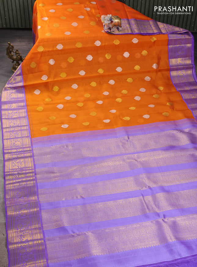 Kora kanchipuram silk saree orange and lavender with silver & gold zari woven buttas and rich zari woven border
